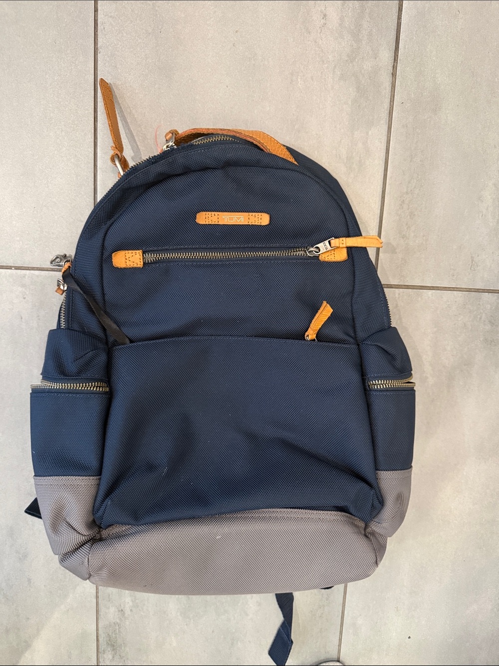 Tumi Navy and Gray Backpack with Tan Accents